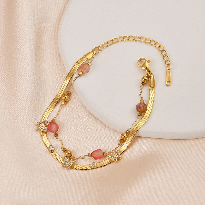 Luxury Gold Butterfly Charm Bracelet – Double-Layer Stainless Steel Chain with Pink Crystal Beads and CZ Stones - Lunelle London