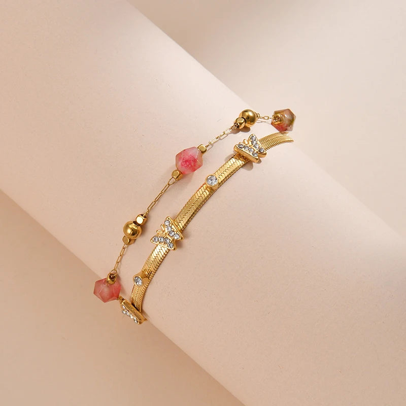Luxury Gold Butterfly Charm Bracelet – Double-Layer Stainless Steel Chain with Pink Crystal Beads and CZ Stones - Lunelle London